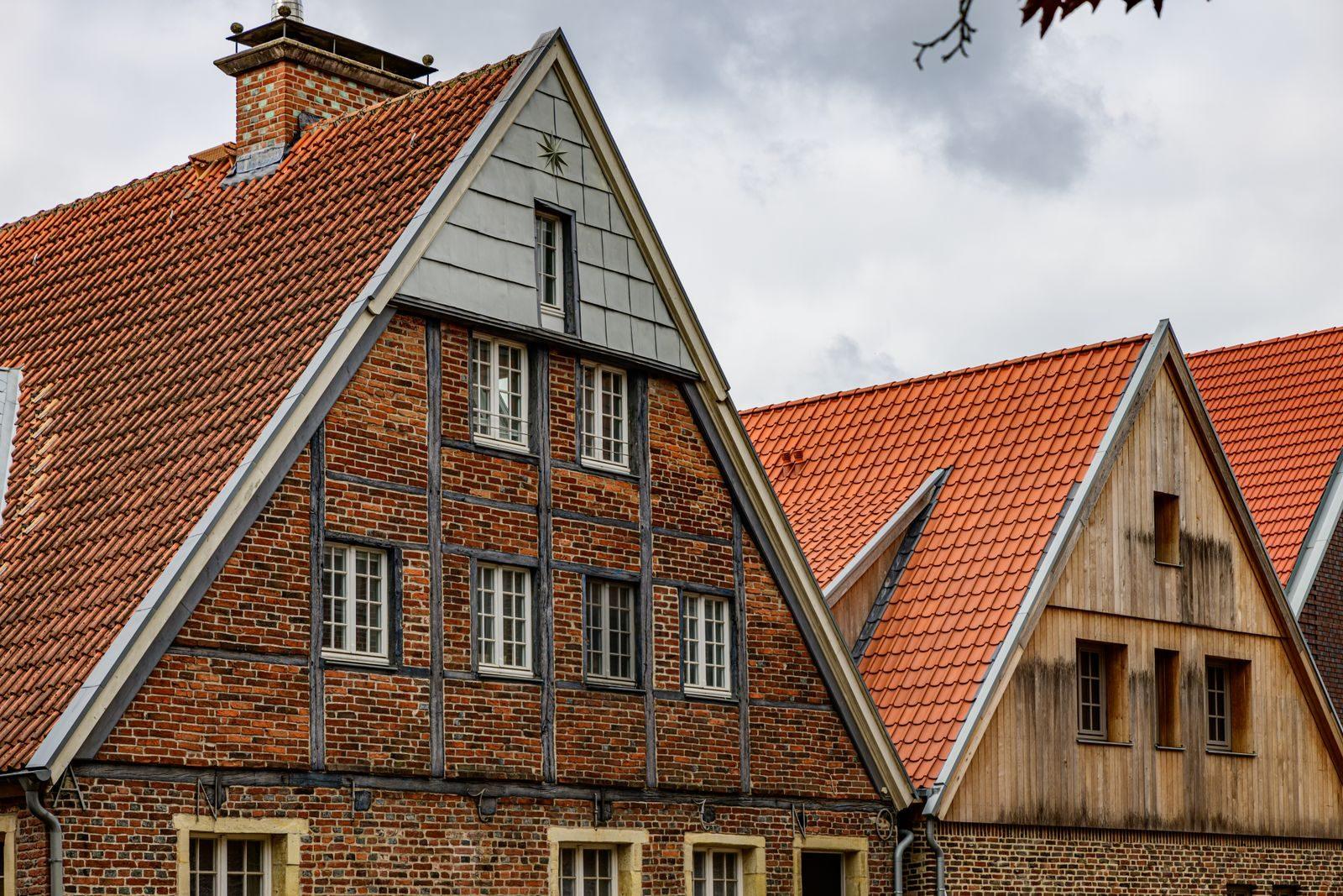 Traditional German brick houses with gabled roofs in Coesfeld, Germany.